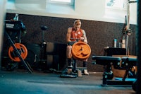 a man lifting weights in a gym
